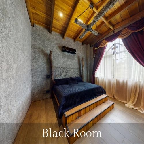 Photo of the Black Room - bedroom of the castle of oz, a playa hermosa costa rica vacation rentals