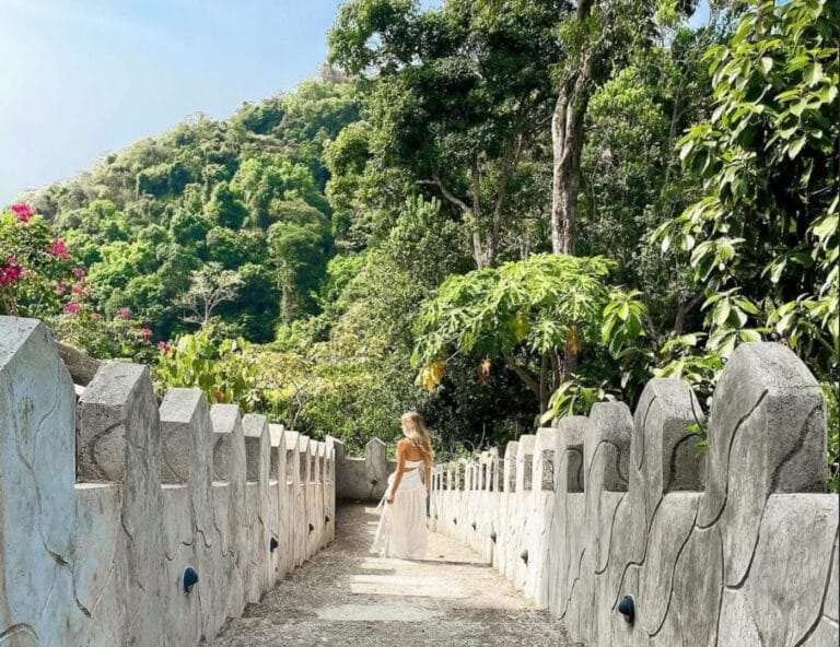 A photo of bride in the bridge of the castle of oz for her Eloping Wedding