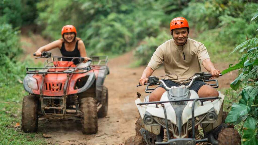 Photo of two people doing one of the best atv tours and Tours in jaco costa rica